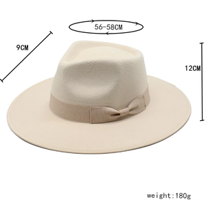 Detail view of beige wool fedora hat showing 56-58cm circumference and 9cm brim dimensions