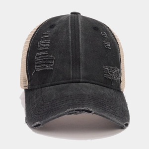 Vintage washed denim trucker hat with distressed holes and breathable mesh for summer