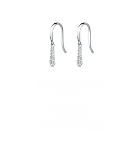 Macro detail of elegant 925 silver drop earrings with graduated white round cut stones
