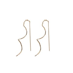 Minimalist gold tassel chain drop earrings with modern spiral wave design on white background