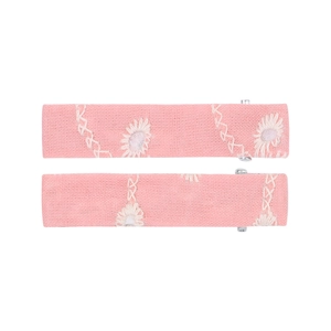 Pair of pink rectangular hair clips with white flower embroidery and linen texture