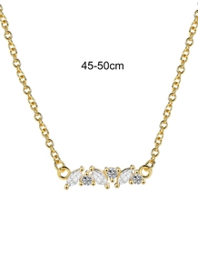 Close-up of sparkling marquise and round zircon pendant on a gold necklace with 45-50cm scale