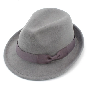 Close-up of grey wool felt fedora hat featuring a dark grey ribbon and bow detail