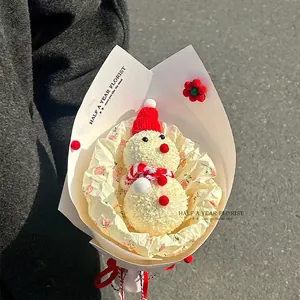 Handmade Christmas snowman flower bouquet with red mini knit hat and striped scarf wrapping