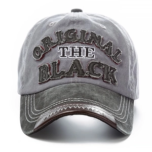 Vintage gray washed cotton baseball cap with original black 3D embroidery and curved brim