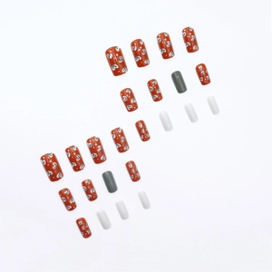 Olive green and brick red press-on nails with retro floral heart patterns in 24 piece set