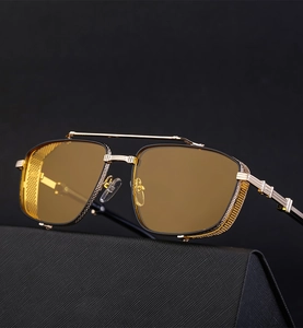 Steampunk sunglasses featuring yellow lenses and detailed metal hollow side shields