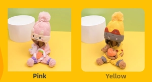 Detail of pink rabbit and yellow bear knit hat and scarf sets for kids winter warmth