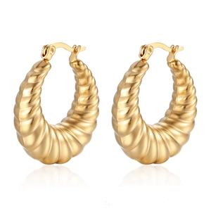 Minimalist golden croissant hoop earrings for women with elegant spiral design on white background