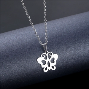 Minimalist silver butterfly pendant necklace in stainless steel with hollow design