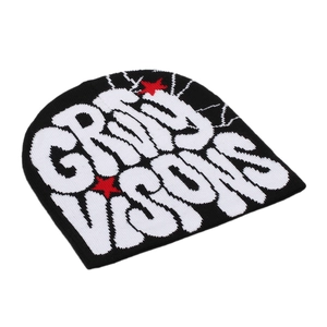 Close-up of GRITY VISIONS knit beanie showing intricate jacquard texture and star design