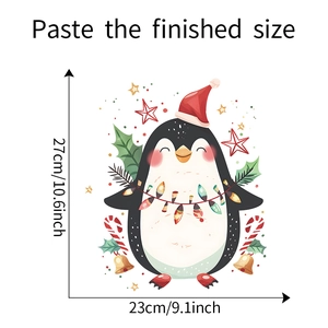 Detail view showing the 23x27cm dimensions of the Christmas penguin wall sticker
