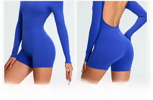 Detail view of royal blue long sleeve yoga bodysuit showing open back and athletic fit