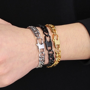 Close-up of hip hop stainless steel cuban chain bracelets in silver black and gold colors