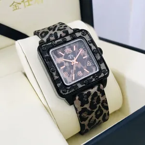 Square quartz watch with leopard print dial and silicone strap featuring black metal case