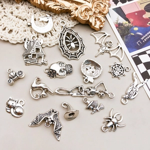 Selection of vintage silver Halloween alloy charms featuring spiders, bats and skulls
