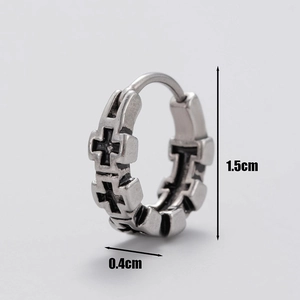 Detailed macro view of vintage silver cross embossed earrings with 1.5cm height measurements