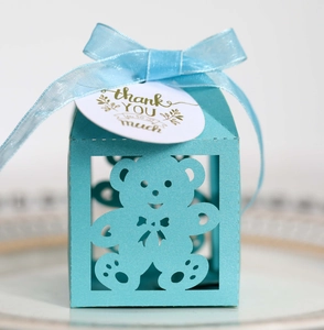 Sky blue hollow bear gift box featuring a delicate ribbon and thank you gift tag