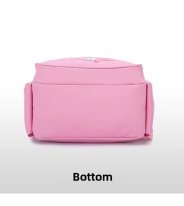 Detail view of the durable pink oxford fabric bottom and precision stitching on the kids backpack