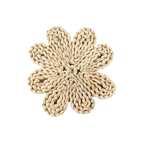 Handwoven flower-shaped natural seagrass wall decor in bohemian style for home accent