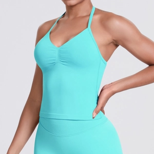 Detail of turquoise seamless yoga set with ruched neckline on the sports bra