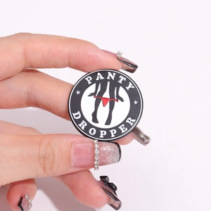 Funny Panty Dropper round enamel pin badge with black and white silhouette for jackets