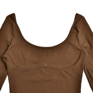 Detail view of brown ribbed knit bodysuit showing square neckline and curved chest stitching