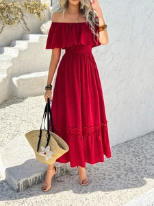 Detailed view of red off-shoulder dress featuring shirred waist and lace hem details