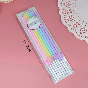 Close-up of 10-piece colorful 11.3cm slender candles in gift pack with pink bow