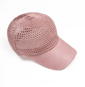 Top view of pink crochet mesh baseball cap showing breathable hollow-out weave pattern
