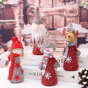Set of four plush Christmas ornaments featuring Santa, snowman, reindeer and angel figures