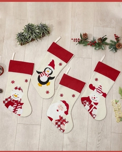 Set of 4 Christmas stockings with Santa, Snowman, Penguin, and Reindeer motifs