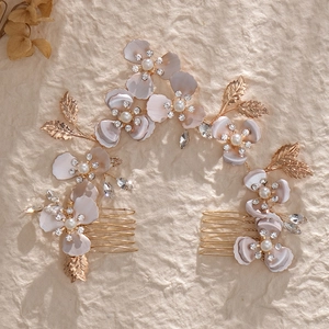 Handmade bridal hair combs set with lavender fabric flowers, pearls and crystals