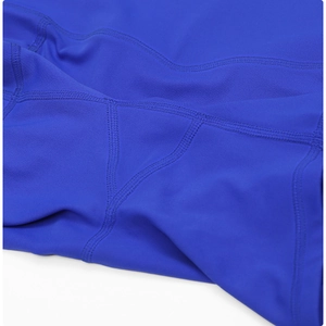 Detailed macro view of high-elasticity fabric with reinforced professional stitching