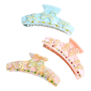 Elegant rhinestone bow claw clips in blue, pink, and multicolor for women's hairstyles