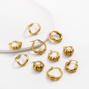 Detailed set of five pairs of vintage style hollow golden stainless steel hoop earrings