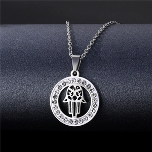 Polished stainless steel Hamsa Hand pendant necklace with circular rhinestone border