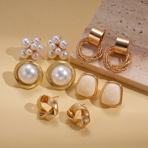 10-piece gold pearl flower earring set featuring minimalist resin and geometric designs