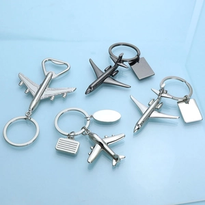 3D metallic airplane model keychain with bottle opener in silver and gun black finishes