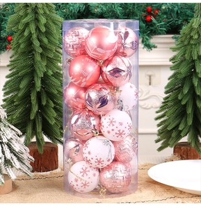 Pink and white Christmas ball ornament set with glitter patterns in clear PVC packaging