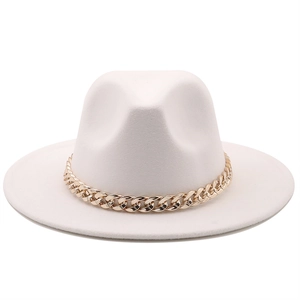 Detailed view of the gold chain ornament on white felt jazz fedora hat with flat brim