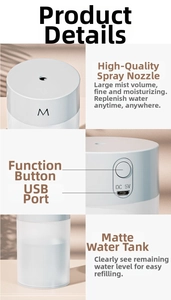 Close-up of USB port and functional button on white mini humidifier with frosted tank