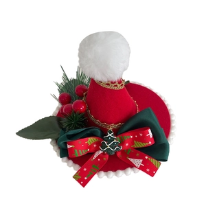 Mini Christmas hat hair clip with red and green bowknot and fluffy white pompom