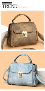 Detail showing vintage textured handbags with golden metal twist locks and round handles