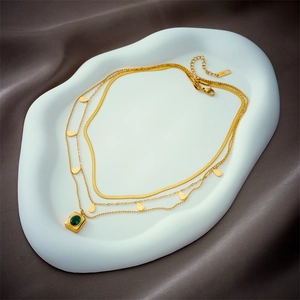 Three-layer gold titanium steel necklace with square green stone and water drop pendants