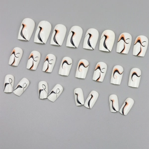 Medium length press-on nails with white base and orange-black abstract wavy line art