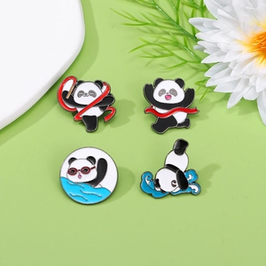 Set of four panda enamel pins showing different sports and swimming poses on green background