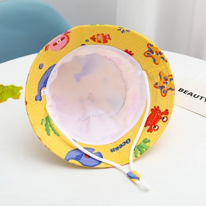 Detailed view of kids yellow sun hat with cartoon ocean patterns and adjustable chin strap