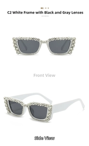 Detail view of white square sunglasses with sparkling rhinestones and grey lenses