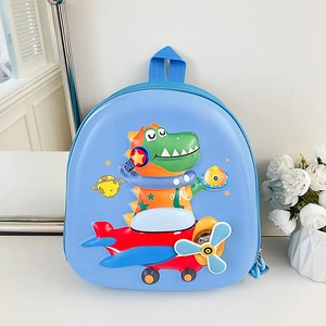 Détail du sac à dos bleu pour enfant avec motif dinosaure 3D et coque rigide en EVA